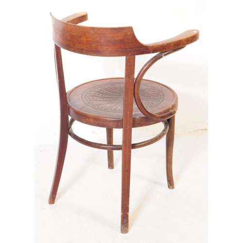 1047 - A set of three mid 20th century bistro Thonet manner bentwood armchairs. Having wrap around tub chai... 