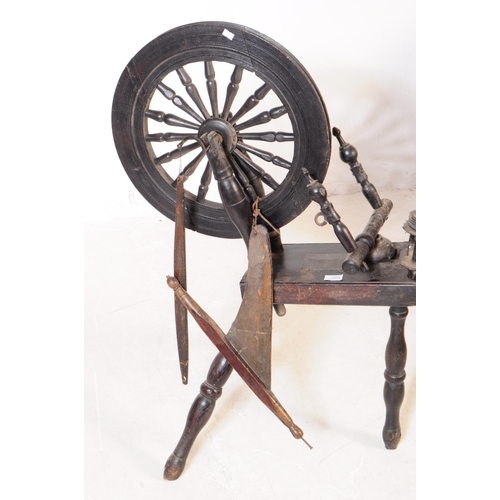 1054 - A 19th century Scottish wool spinning wheel. With ebonised oak wood turned spoked wheel with turned ... 