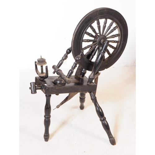 1054 - A 19th century Scottish wool spinning wheel. With ebonised oak wood turned spoked wheel with turned ... 