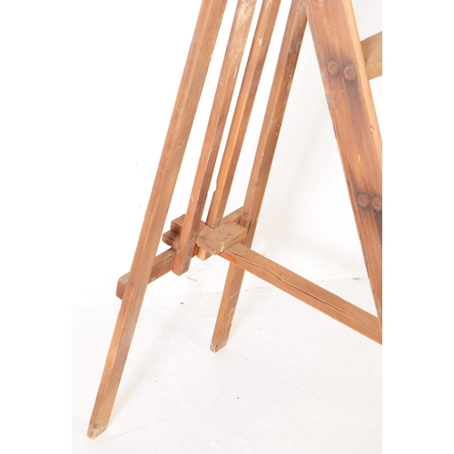 567a - A vintage 20th century wooden pine step ladder. Having an A frame with folding mechanism. Measures a... 