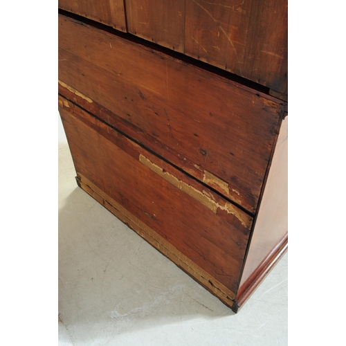 1057 - A large early 20th century mahogany library bookcase cabinet. With pediment top, twin lead glazed hi... 