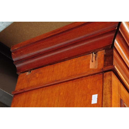 1057 - A large early 20th century mahogany library bookcase cabinet. With pediment top, twin lead glazed hi... 