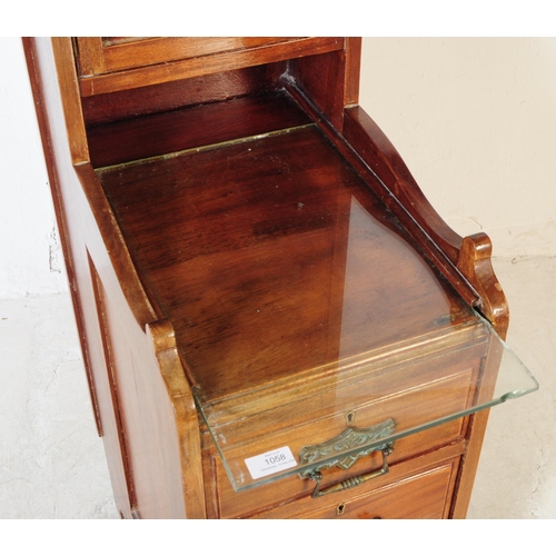 1058 - A Victorian mahogany bathroom chest of drawers cabinet. The chest raised on block feet, of narrow fo... 