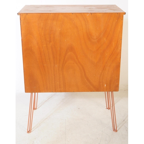 550a - Alfred Cox - A vintage mid 20th century chest of drawers. Rectangular form with flared top, bank of ... 