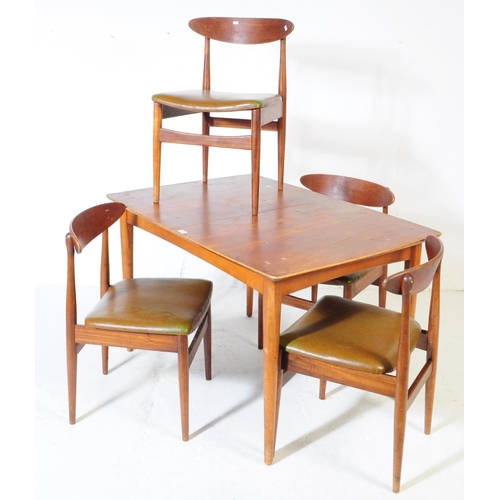 555 - British Modern Design - A mid century teak dining table and four chairs. Rectangular form with exten... 