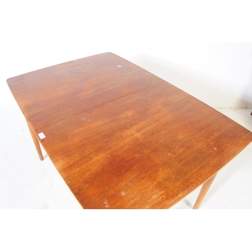 555 - British Modern Design - A mid century teak dining table and four chairs. Rectangular form with exten... 