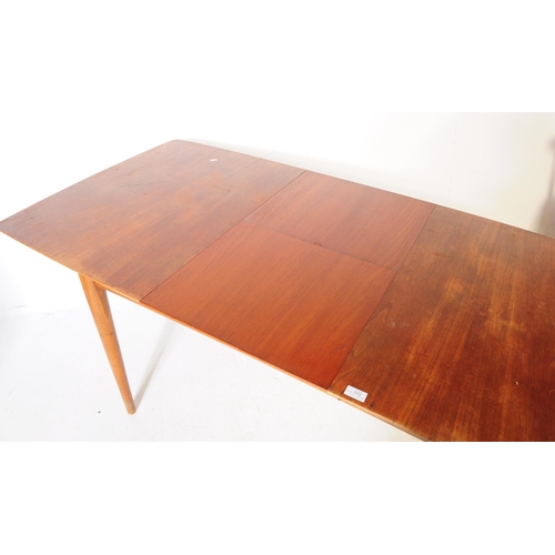 555 - British Modern Design - A mid century teak dining table and four chairs. Rectangular form with exten... 