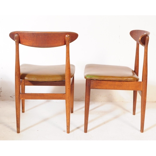 555 - British Modern Design - A mid century teak dining table and four chairs. Rectangular form with exten... 