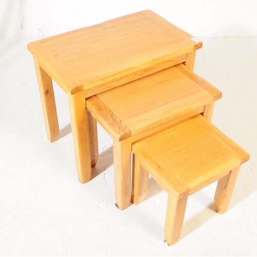 556 - Oak Furniture Land Manner - A contemporary Oak Furniture Land manner oak wood nest of tables. The ne... 