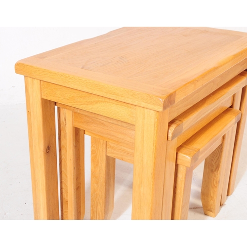 556 - Oak Furniture Land Manner - A contemporary Oak Furniture Land manner oak wood nest of tables. The ne... 