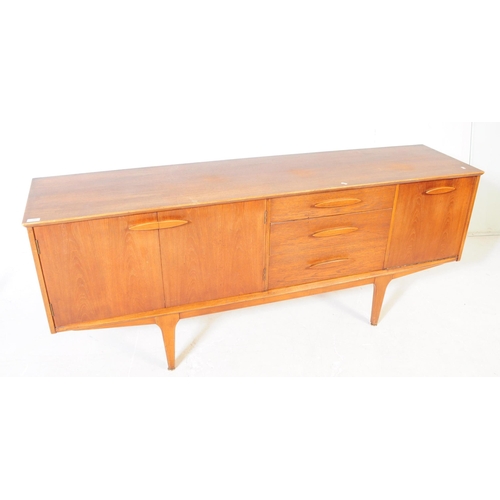 557 - Jentique Furniture - A mid 20th century teak wood sideboard credenza. Rectangular form with twin cab... 