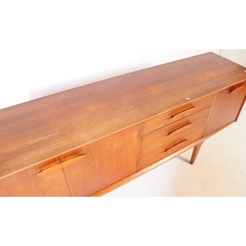 557 - Jentique Furniture - A mid 20th century teak wood sideboard credenza. Rectangular form with twin cab... 