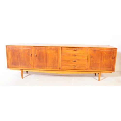 557a - British Modern Design - Vintage mid century long john teak wood sideboard credenza. Rectangular form... 