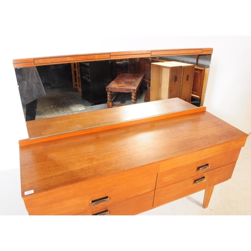 562a - British Modern Design - Mid 20th century teak dressing table. Rectangular form with two overhang upp... 