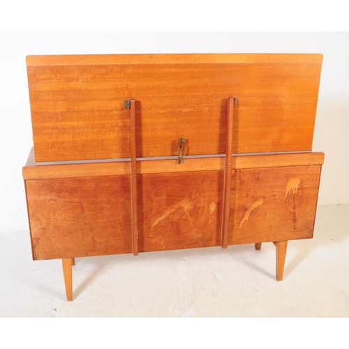 562a - British Modern Design - Mid 20th century teak dressing table. Rectangular form with two overhang upp... 