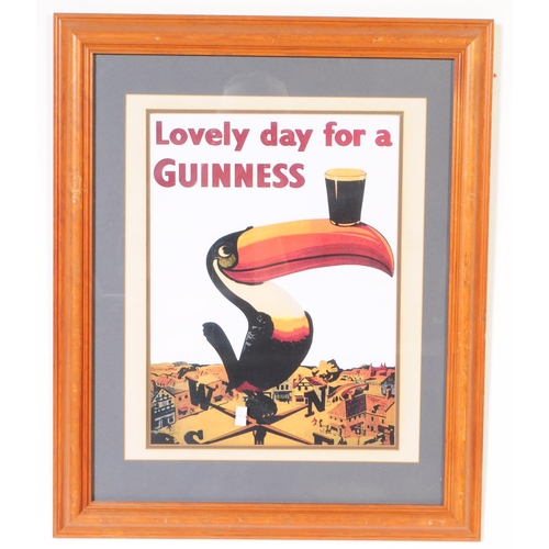 564 - Guinness - A collection of four advertising reproduction Guinness prints. Framed and glazed. Depicti... 