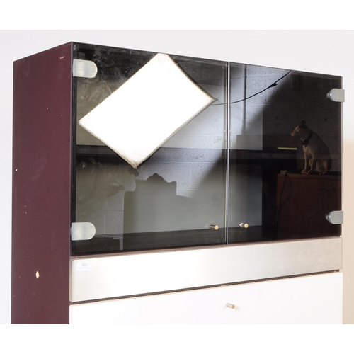 565 - Two contemporary aluminium and glass bookcase / cabinet wall units. Of rectangular form with smoke g... 