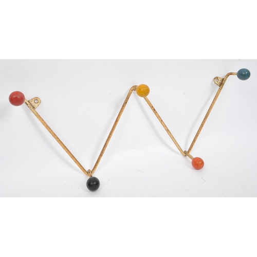 576 - A 20th Century retro sputnik / atomic coat hook rack / hanger of 'W' shape form. The rack with paint... 