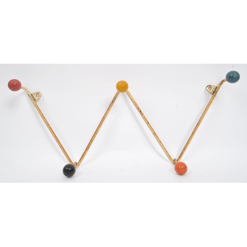 576 - A 20th Century retro sputnik / atomic coat hook rack / hanger of 'W' shape form. The rack with paint... 