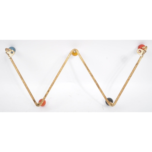 576 - A 20th Century retro sputnik / atomic coat hook rack / hanger of 'W' shape form. The rack with paint... 