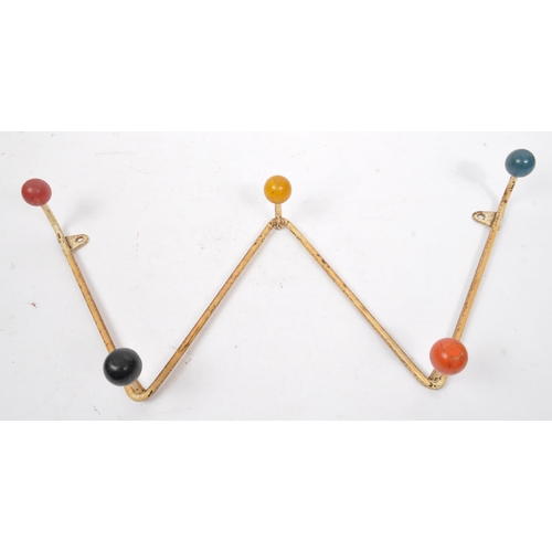 576 - A 20th Century retro sputnik / atomic coat hook rack / hanger of 'W' shape form. The rack with paint... 