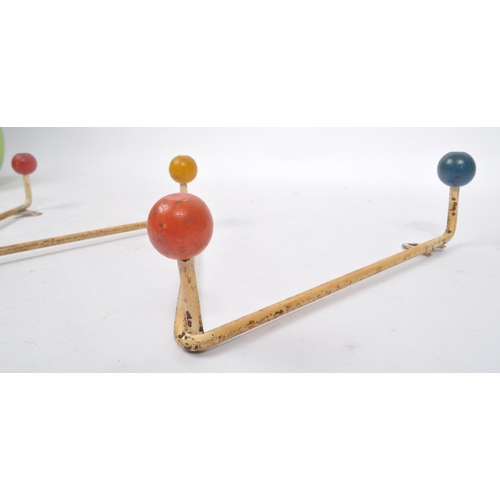 576 - A 20th Century retro sputnik / atomic coat hook rack / hanger of 'W' shape form. The rack with paint... 