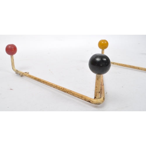 576 - A 20th Century retro sputnik / atomic coat hook rack / hanger of 'W' shape form. The rack with paint... 