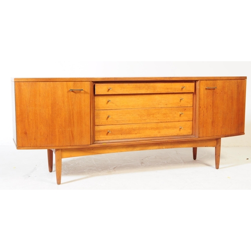 586 - British Modern Design - A mid 20th century circa 1960s teak sideboard. The sideboard having four cen... 