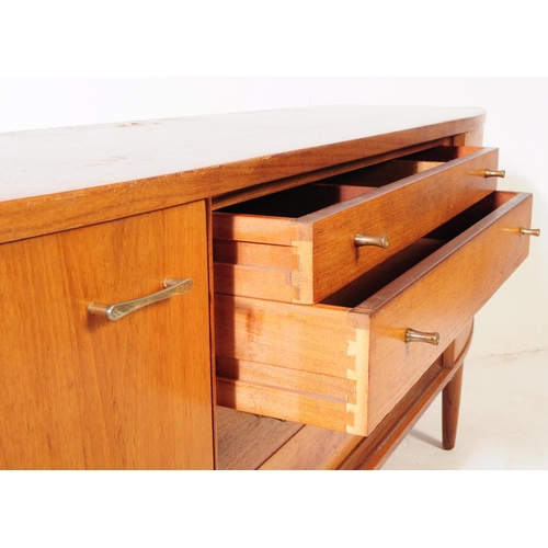 586 - British Modern Design - A mid 20th century circa 1960s teak sideboard. The sideboard having four cen... 