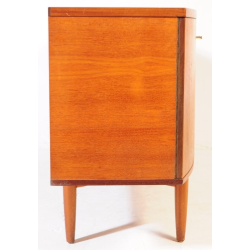 586 - British Modern Design - A mid 20th century circa 1960s teak sideboard. The sideboard having four cen... 