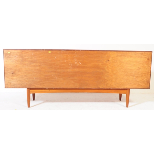 586 - British Modern Design - A mid 20th century circa 1960s teak sideboard. The sideboard having four cen... 