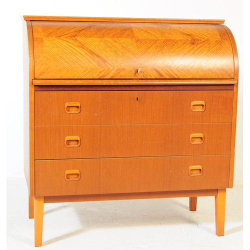 593 - A retro mid 20th century Scandinavian teak veneered roll top bureau desk in the manner of Egon Oster... 