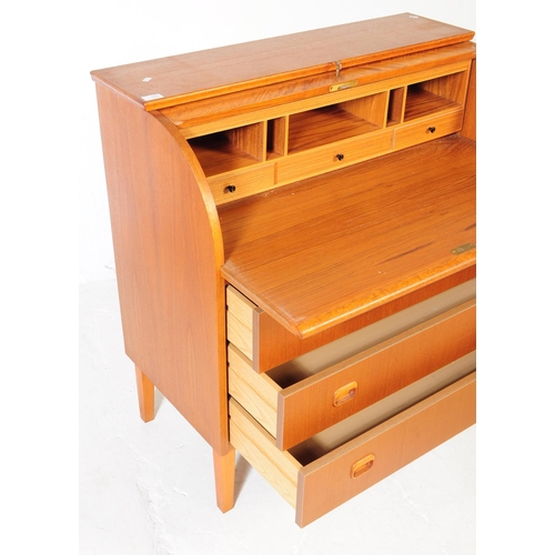 593 - A retro mid 20th century Scandinavian teak veneered roll top bureau desk in the manner of Egon Oster... 