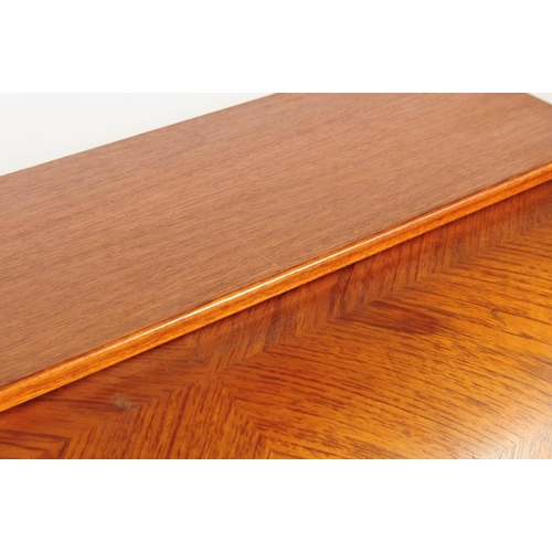 593 - A retro mid 20th century Scandinavian teak veneered roll top bureau desk in the manner of Egon Oster... 