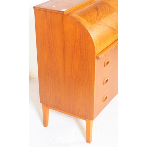 593 - A retro mid 20th century Scandinavian teak veneered roll top bureau desk in the manner of Egon Oster... 