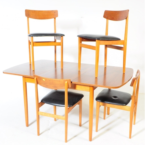 595 - British Modern Design - A retro mid 20th century formica topped dining table and four chairs. The di... 