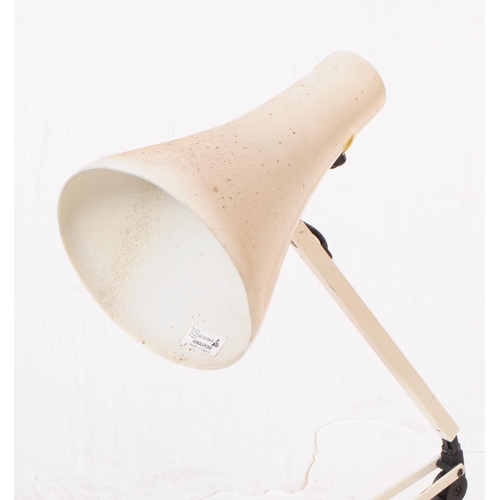 597 - Anglepoise - A mid 20th century Anglepoise adjustable desk lamp. The lamp in a white colourway with ... 