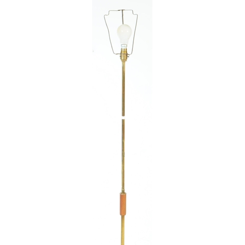 605 - A vintage 20th century floor standing standard lamp light. Having metal and wood construction with a... 