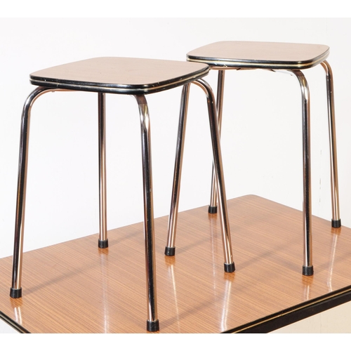 609 - British Modern Design - A vintage 20th century kitchen table with pair of stools and chairs. Rectang... 