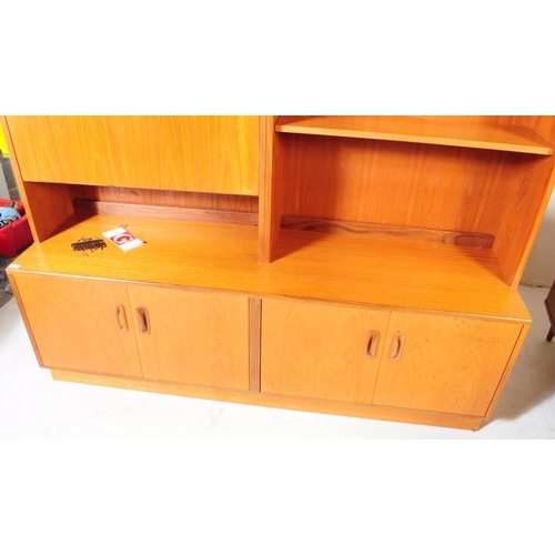 625 - G-Plan - A mid 20th century teak wood G-Plan highboard modular wall unit. Having cupboards to the ba... 