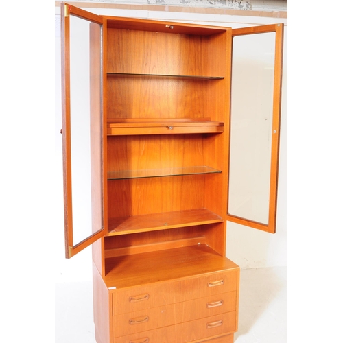 626 - G-Plan - A mid 20th century teak wood G-Plan single highboard modular wall unit. Having cupboard to ... 