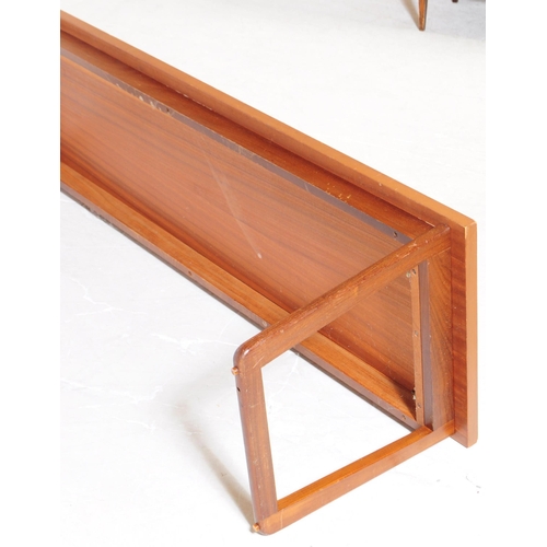 630 - Manner of Merrow Associates - A mid 20th century manner of Merrow Associates teak wood coffee table.... 