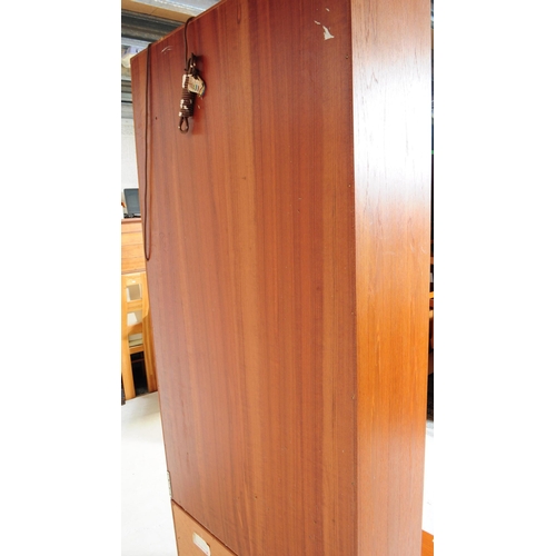 632 - G-Plan - A mid 20th century teak wood G-Plan single highboard modular wall unit. Having cupboard to ... 