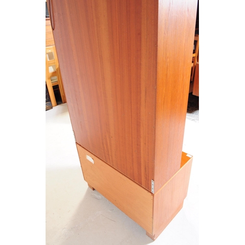 632 - G-Plan - A mid 20th century teak wood G-Plan single highboard modular wall unit. Having cupboard to ... 