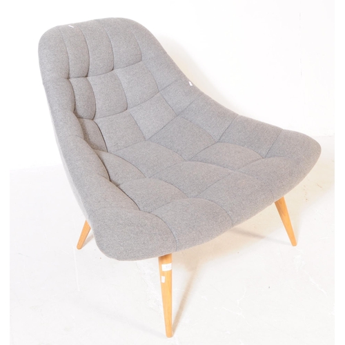 635 - MADE - A contemporary MADE.com Kolton lounge armchair. The chair upholstered in grey fabric, raised ... 