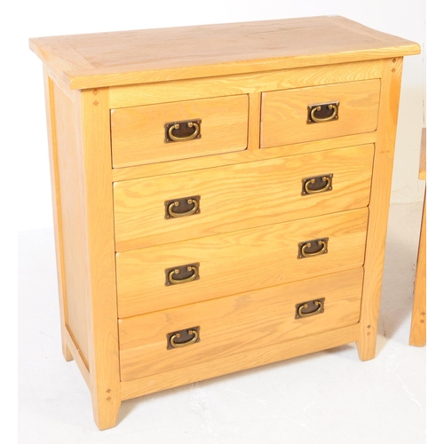 637 - A contemporary Oak Furniture Land manner part bedroom suite. The collection consisting of a chest of... 