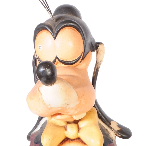 679 - Disney - A vintage 20th century Goofy dog Disney character in the form as a butler. In a standing po... 