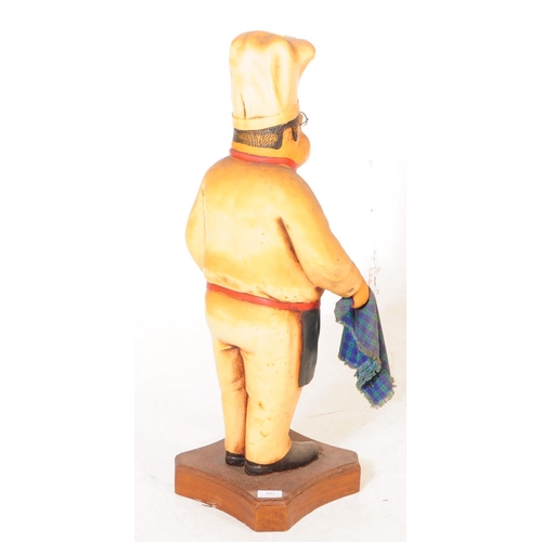 681 - A mid 20th century restaurant Italian chef prop display statue / figurine. In the typical chefs unif... 