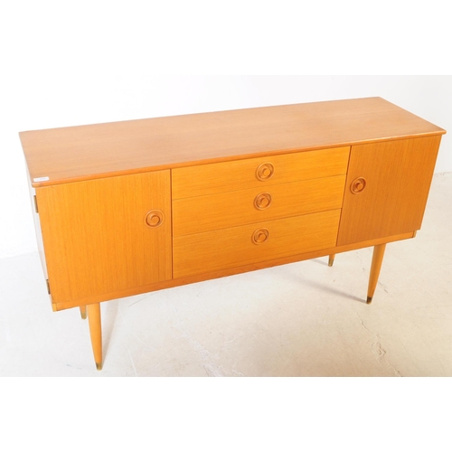 688 - Schreiber Furniture - A mid 20th century Schreiber Furniture light oak veneered sideboard credenza. ... 