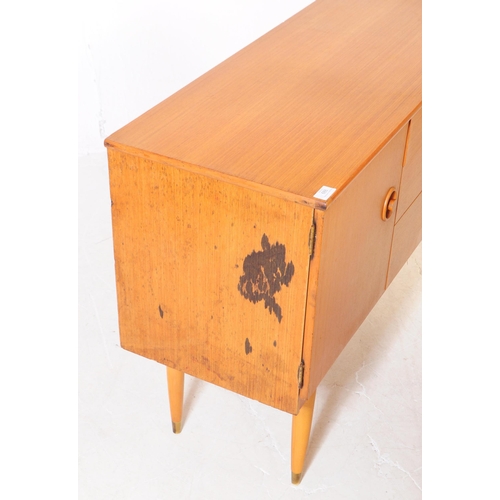 688 - Schreiber Furniture - A mid 20th century Schreiber Furniture light oak veneered sideboard credenza. ... 